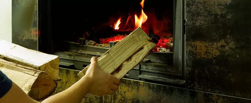 Wood Stove Heat Resistant Wall Repair in Alma, Quebec